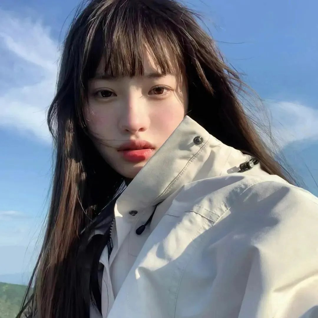 桃花含露又春风